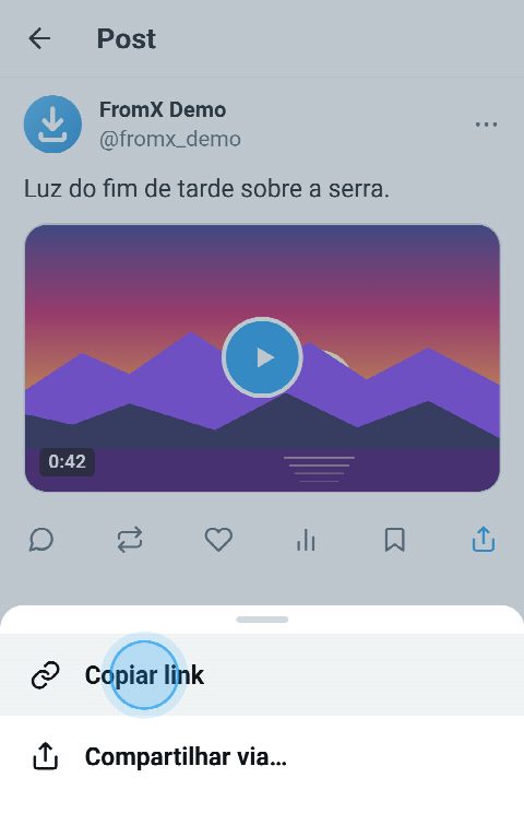 Um post com vídeo no X, com o menu de compartilhar aberto e “Copiar link” selecionado